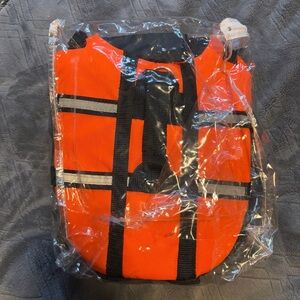 New in bag doggie life vest